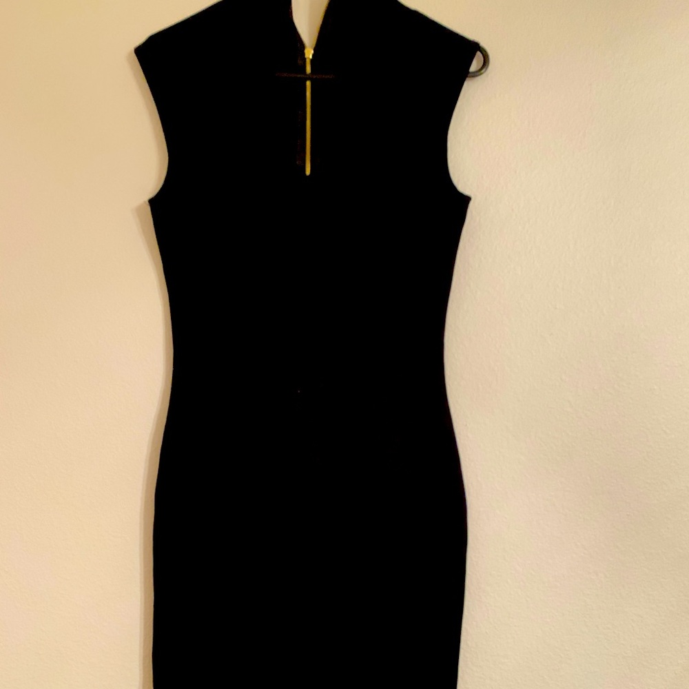 Black cocktail sheath dress.